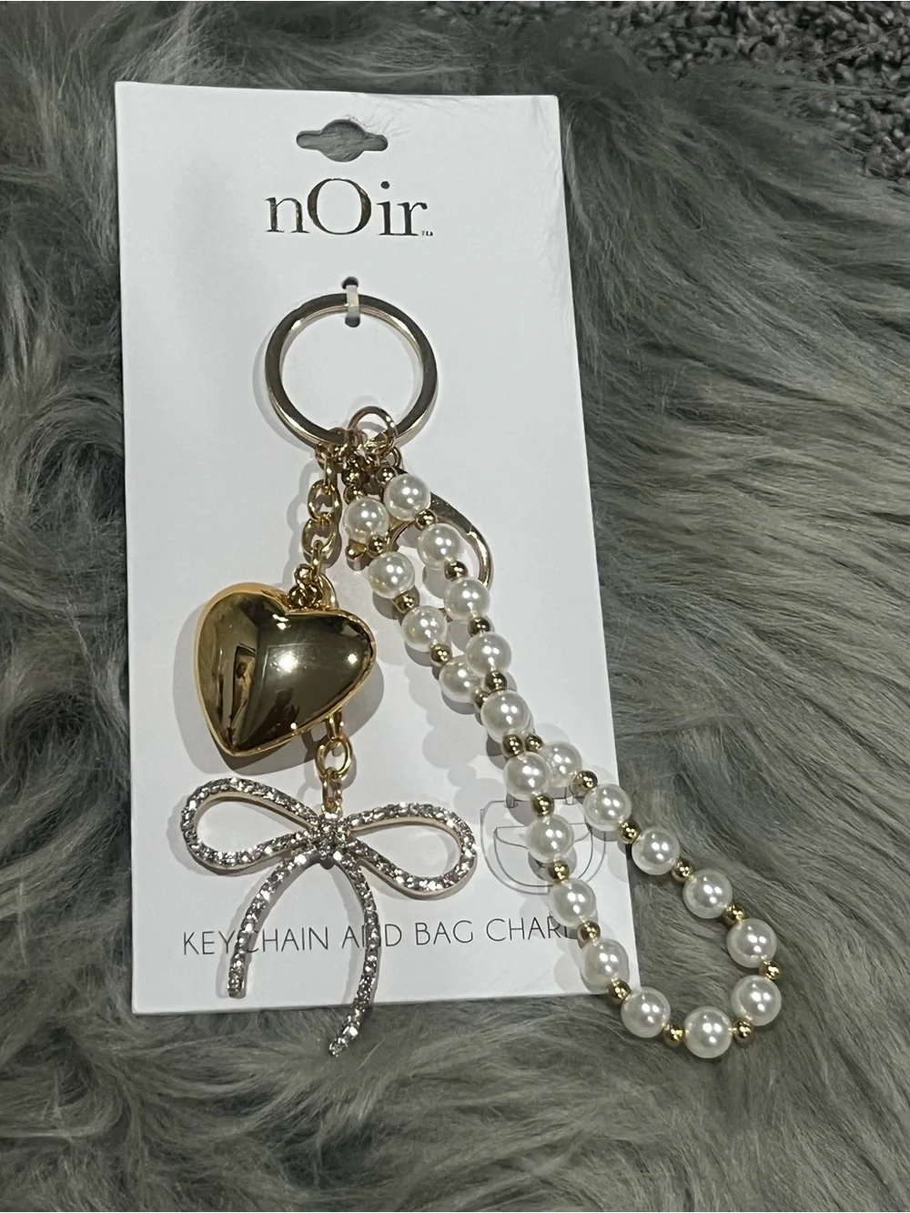 nOir Jewelry add touch